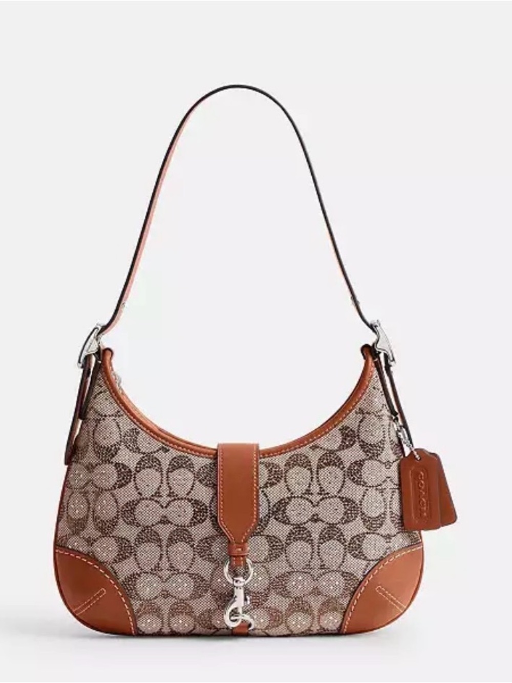Coach Hamptons Hobo Bag
In Crystal Signature Jacquard